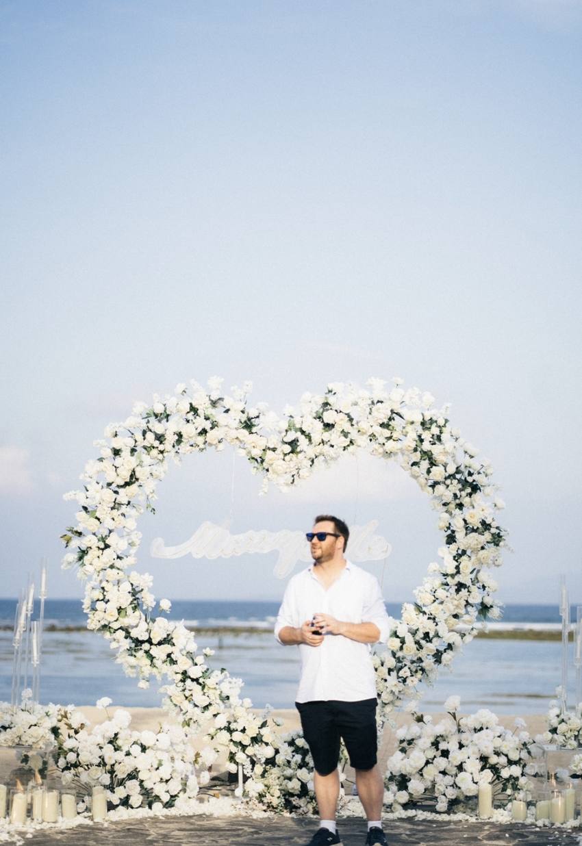 Boyd waiting at the heart of white roses