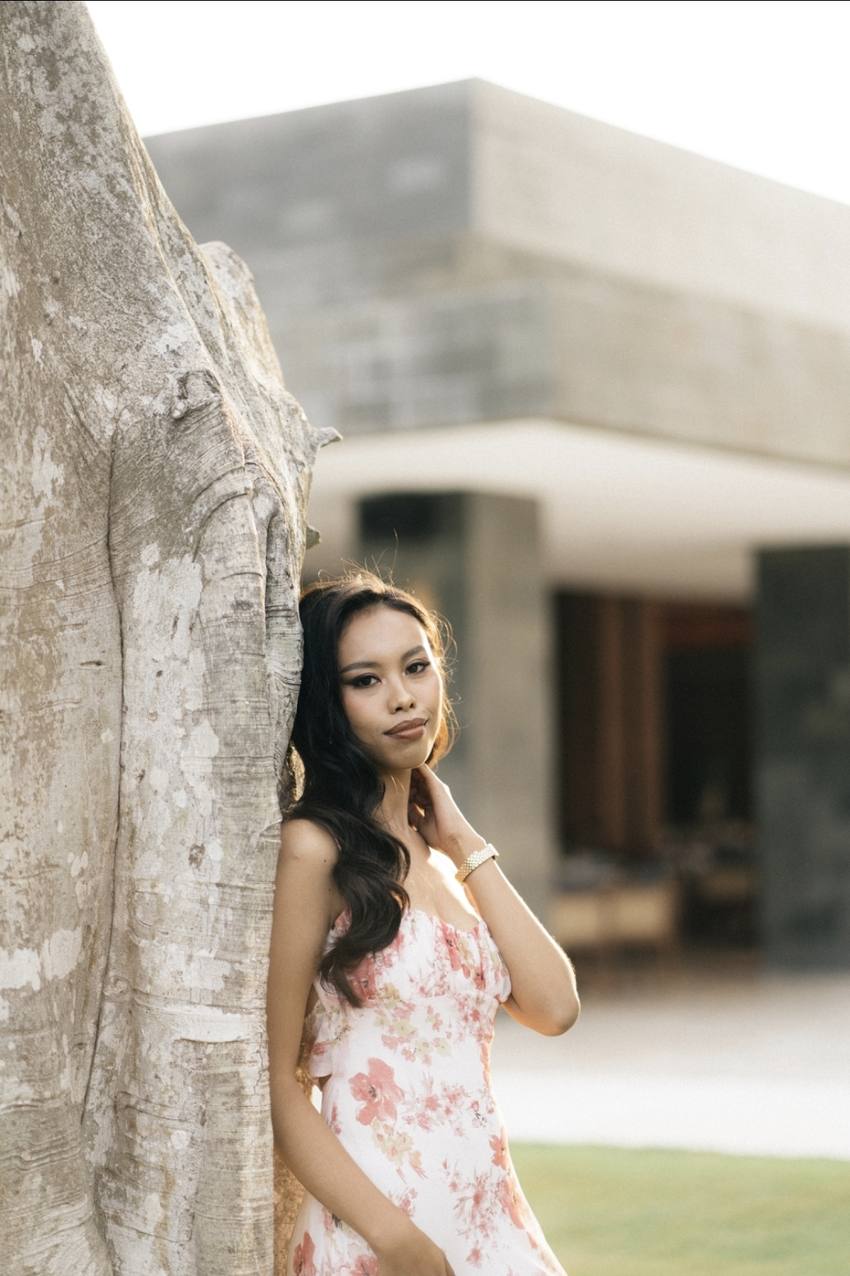 Bintang beside a frangipani tree
