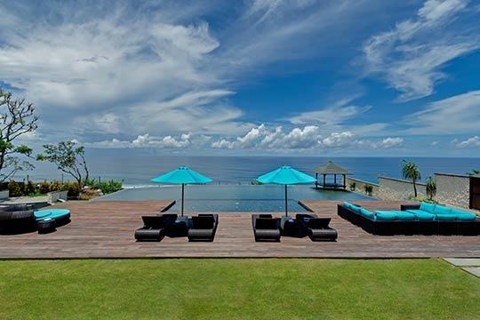 The Pala's infinity pool and clifftop lawn, where the ceremony happens